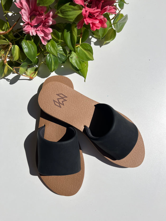Ellie Jet memory foam sandal with arch support with a black faux suede strap and beige footbed
