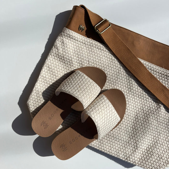 Ellie Hampton memory foam slide sandal with arch support and a cream woven strap and beige footbed and matching Monroe Messenger bag