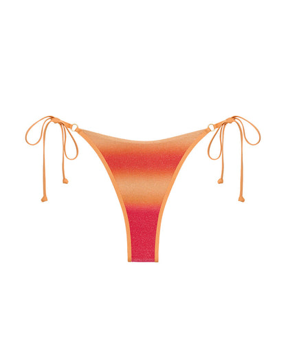 Off-model image of the LSPACE Ocaso Banning Bikini Bottom with ombre sunset print and side tie strings.