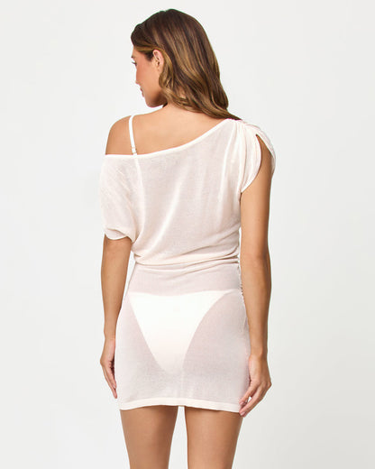 Back view of model wearing the LSPACE Frankie Mini in tapioca.