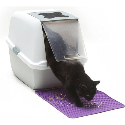 Cat using litter mat