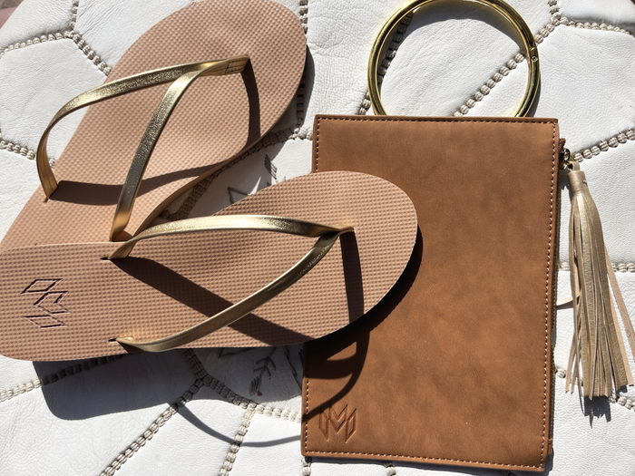 Lux Golden minimalist flip flop with thin gold metallic strap and beige arch support footbed and matching Parker Clutch