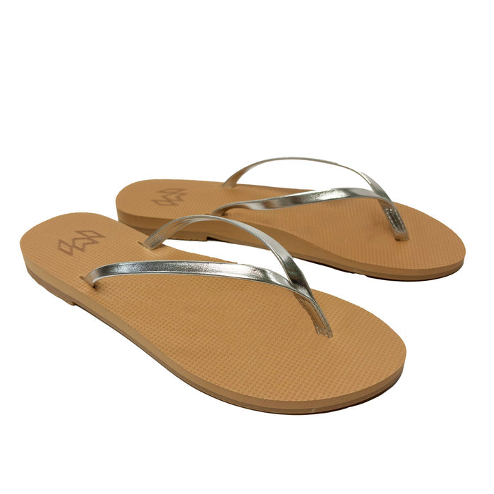 Lux Starry minimalist flip flop with thin silver metallic strap and beige arch support footbed