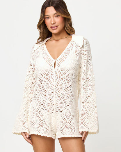 Close-up of the LSPACE x The Salty Blonde Golden Daze Romper in cream showing the neckline and bodice detail.