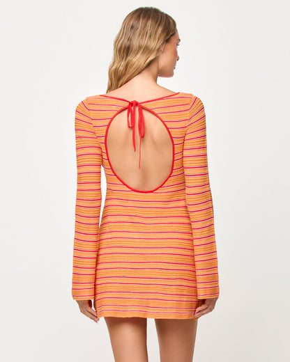 Back view of model wearing the LSPACE x The Salty Blonde Tita Dress in chili pepper stripe.
